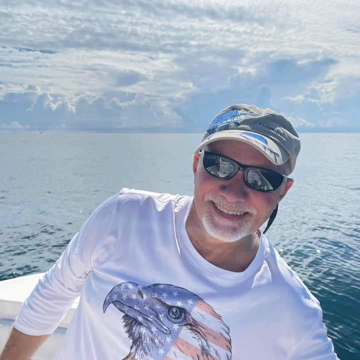 John Heaning on a boat