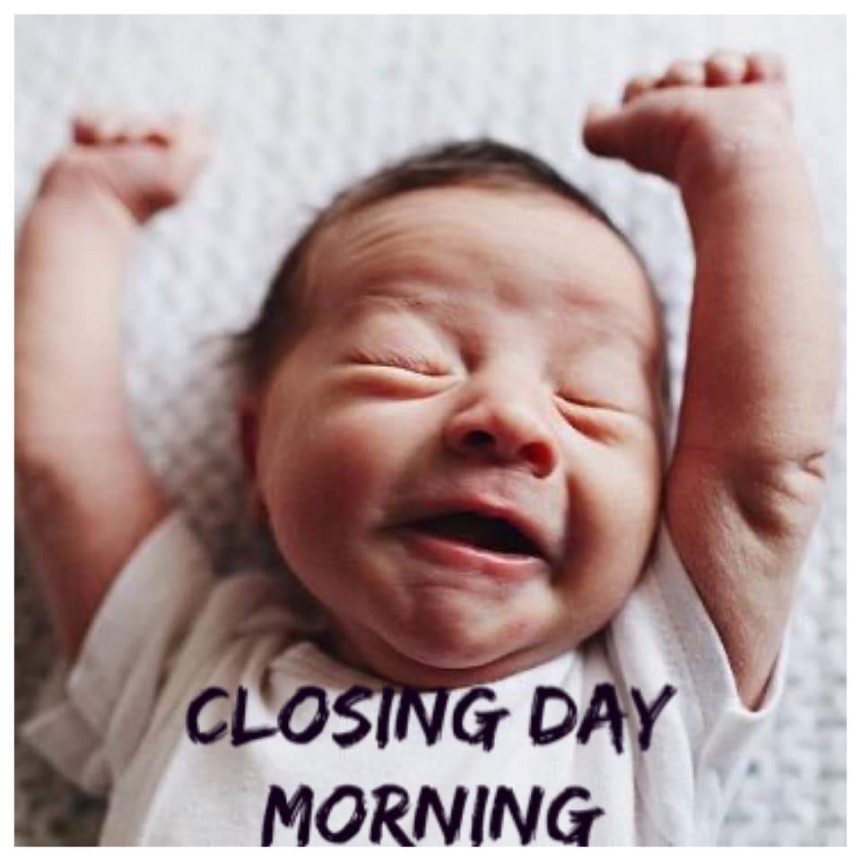 Baby stretching with text that reads, 'closing day morning'